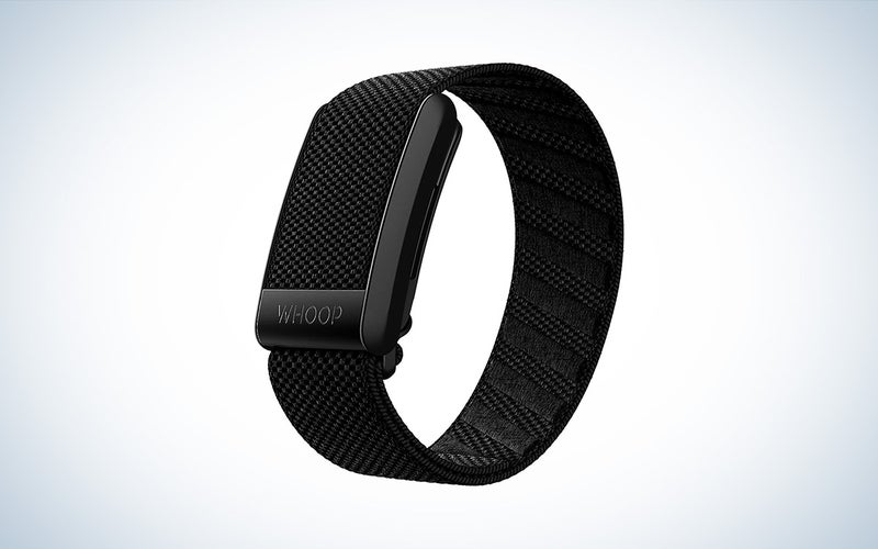 A Whoop 4.0 cheap fitness tracker with black band against a white background